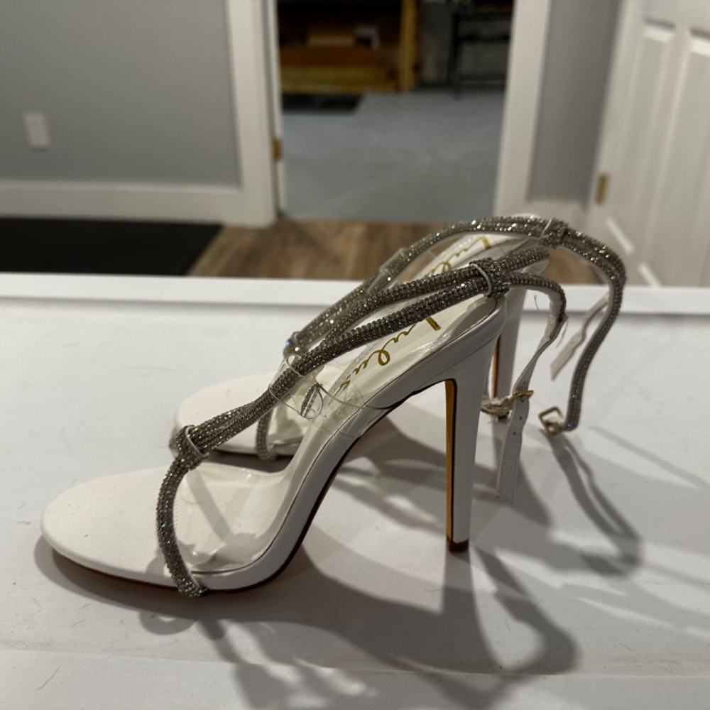 Lulus White and Silver Stilettos.